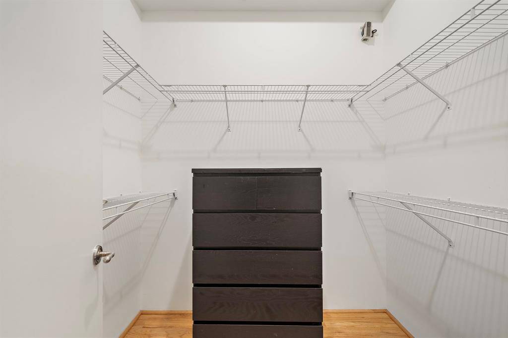 A nice sized closet between the bedroom and bath. The dresser can be moved out.
