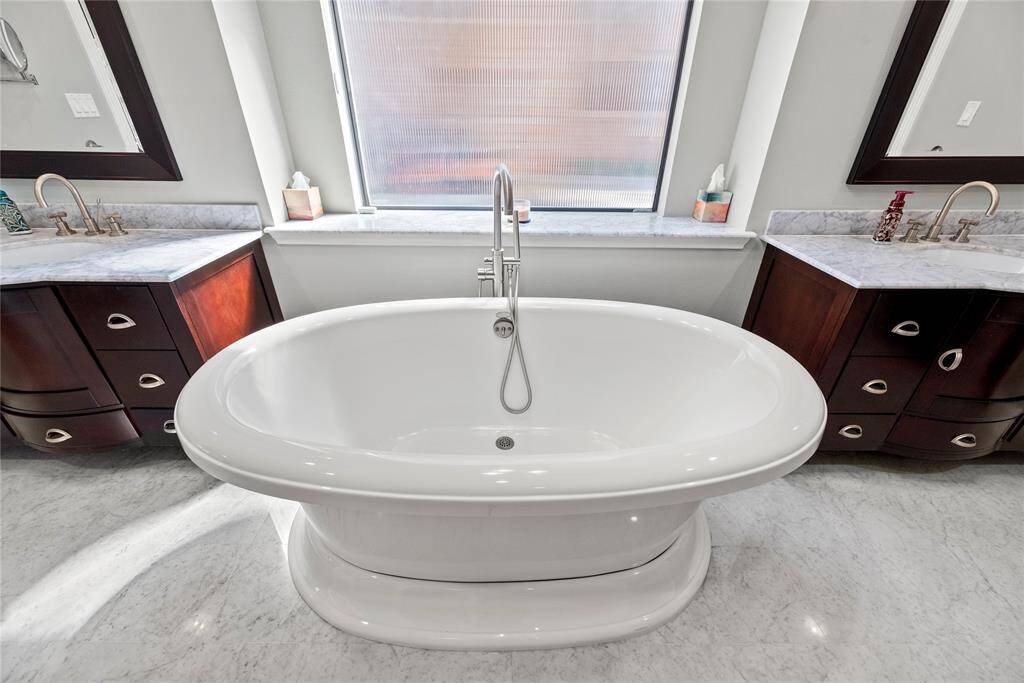 The separate soaking tub promises relaxation, so sink in and wash the cares of the day away.