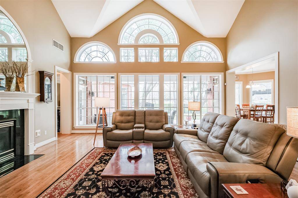 ENJOY THE PANORAMIC BACKYARD VIEW FROM THIS BEAUTIFULLY DESIGNED FAMILY ROOM—A SPACE YOU’LL NEVER WANT TO LEAVE.