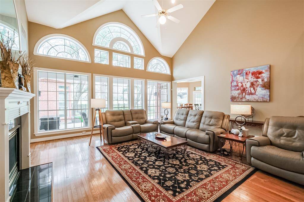 ANOTHER VIEW OF THE LIVING ROOM AREA, GIVING YOU A CLOSER LOOK AT THE INVITING AMBIANCE AND WELL-APPOINTED DETAILS.