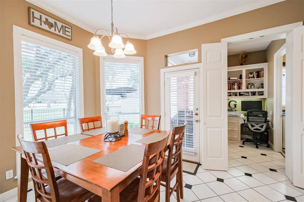 THIS KITCHEN ISLAND WITH ELECTRIC COOKTOP  IS A HOME-COOK'S DREAM! THE SPACIOUS LAYOUT IS PERFECT FOR CREATING CULINARY DELIGHTS WHILE ENTERTAINING GUESTS.