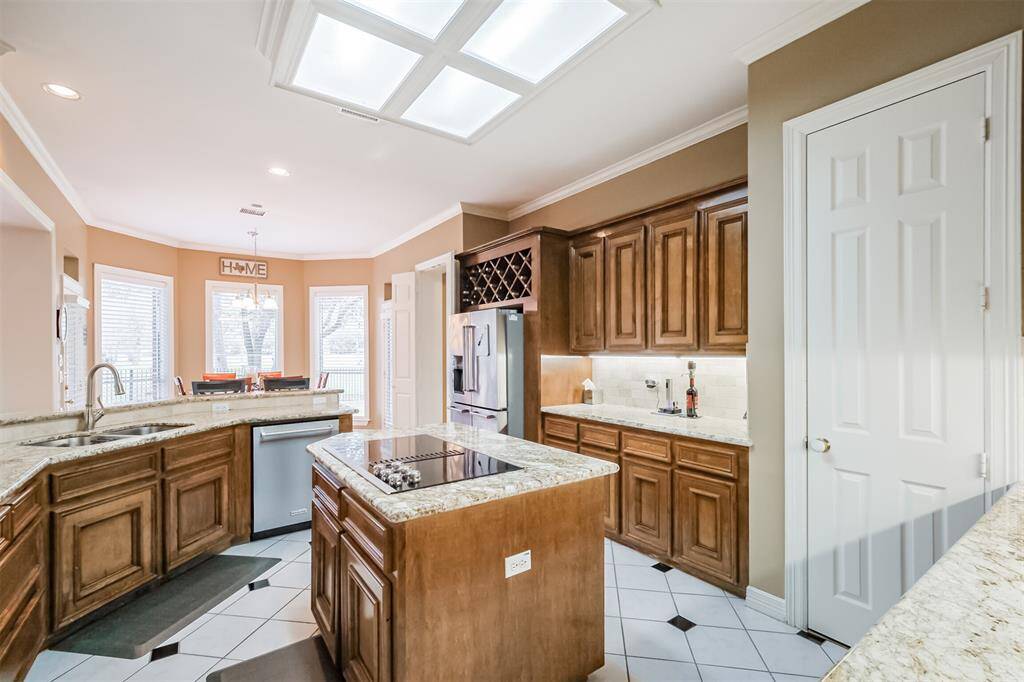 STORAGE GALORE! KITCHEN OFFERS AN ABUNDANCE OF CABINET SPACE MAKING ORGANIZATION EFFORTLESS.