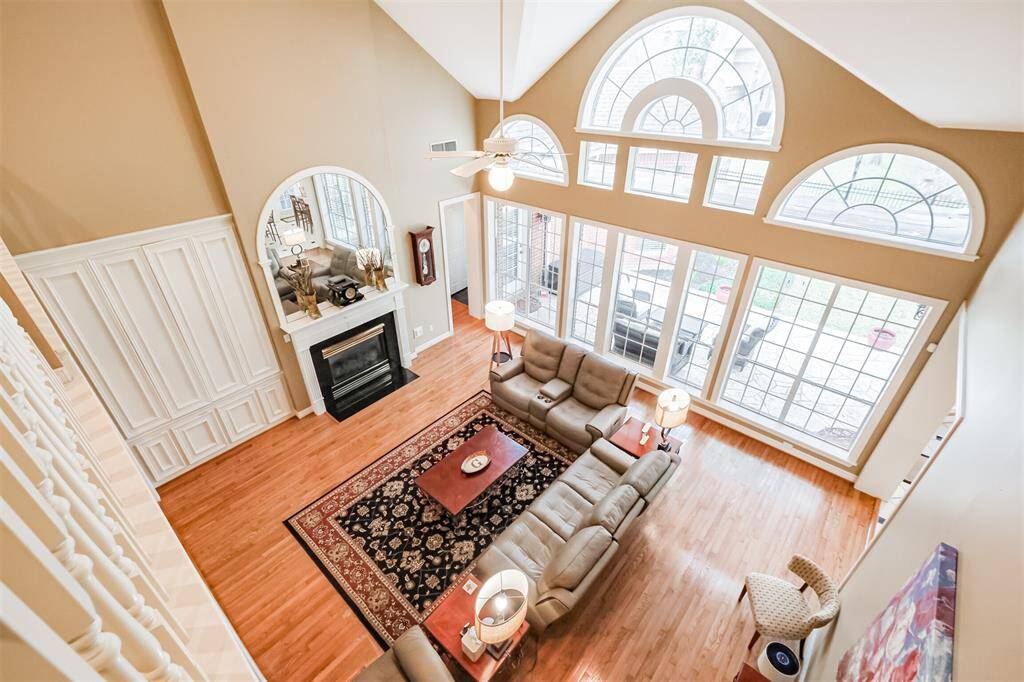 BEDROOM 2 WITH VAULTED CEILINGS AND PLUSH CARPET.