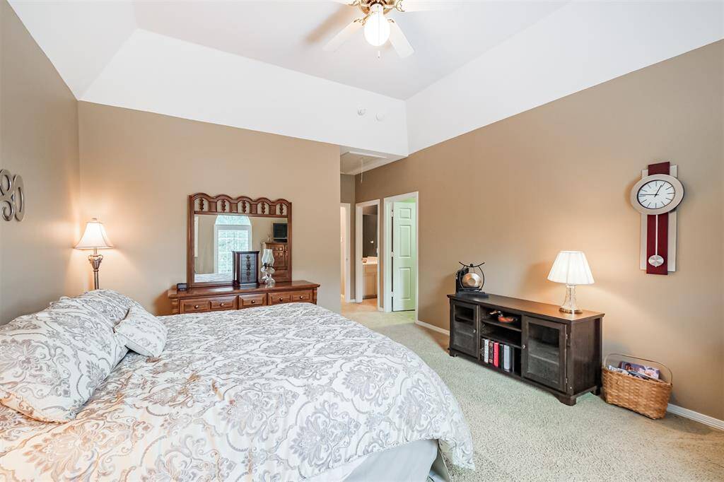 STYLISH SECONDARY BATHROOM WITH A TUB/SHOWER COMBO, PERFECT FOR GUESTS OF ALL AGES.