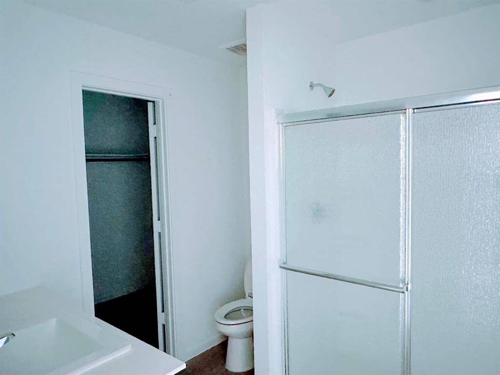 master bath has a enclosed shower