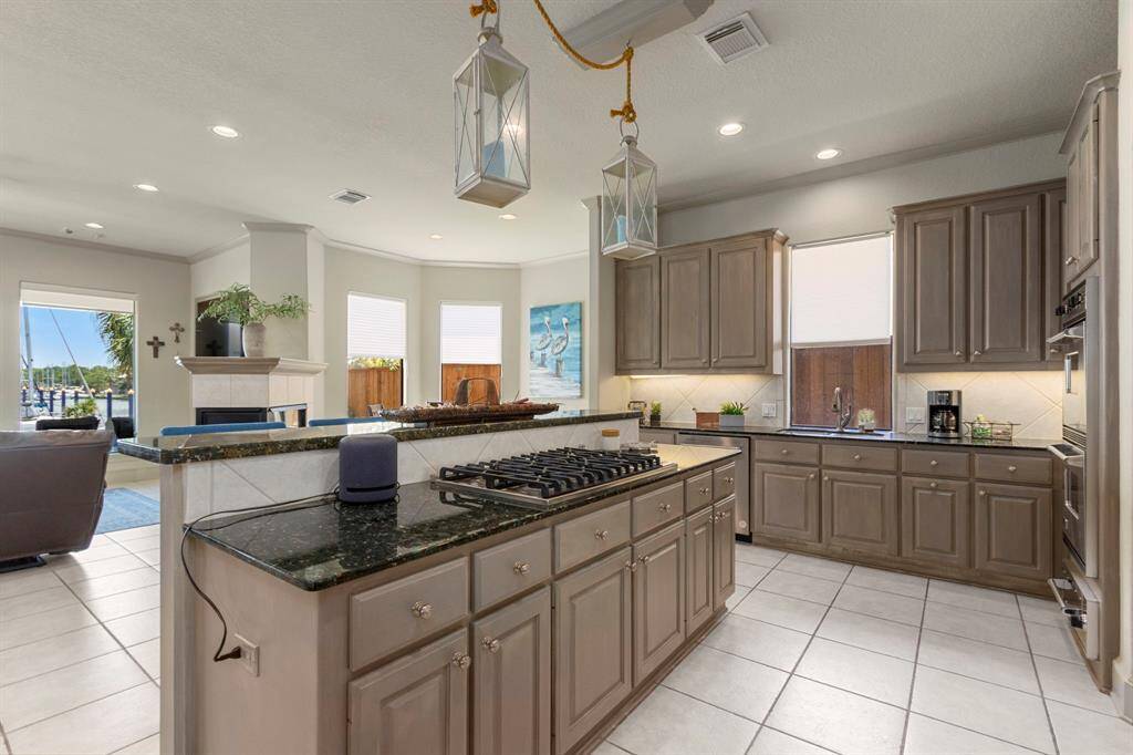 The kitchen overlooks the living and breakfast area.