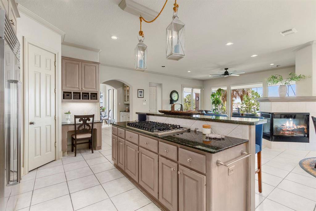 The kitchen also has a large pantry and built-in desk perfect for organizing recipes or managing your household.