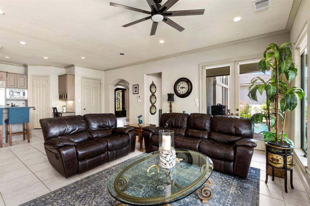 The Spacious Family Room Houses Plenty of Seating.