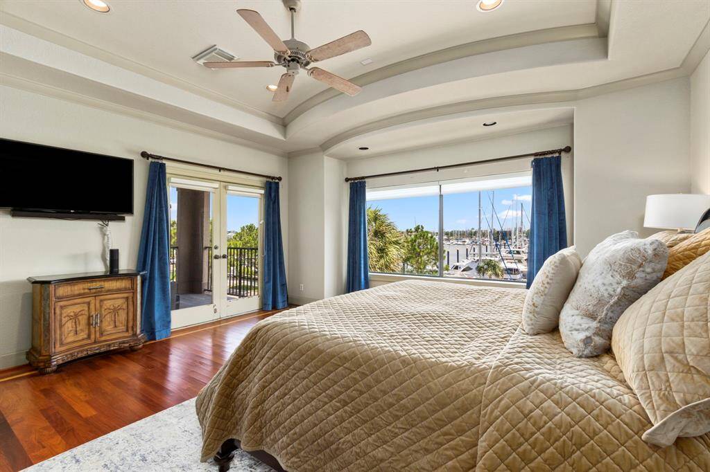 Enjoy Peaceful Waterfront Views from Bed or the Balcony.