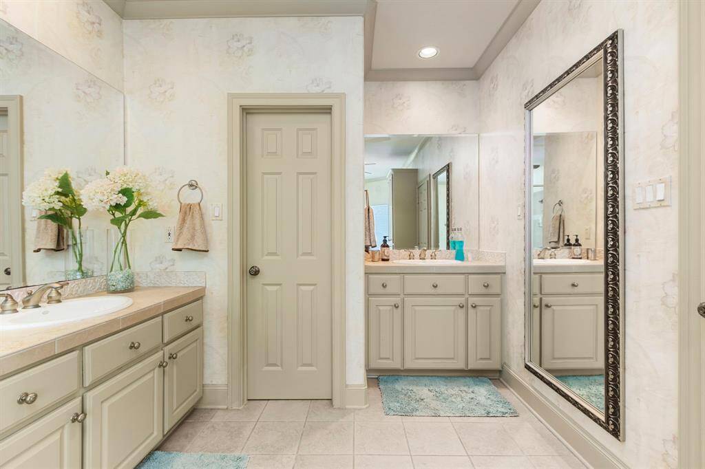 The Primary Bathroom offers Spacious Dual Sink Vanities.