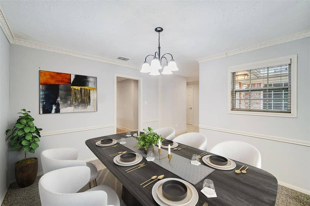 Your dining room has plenty of sitting for all your family gatherings!  Virtually staged!