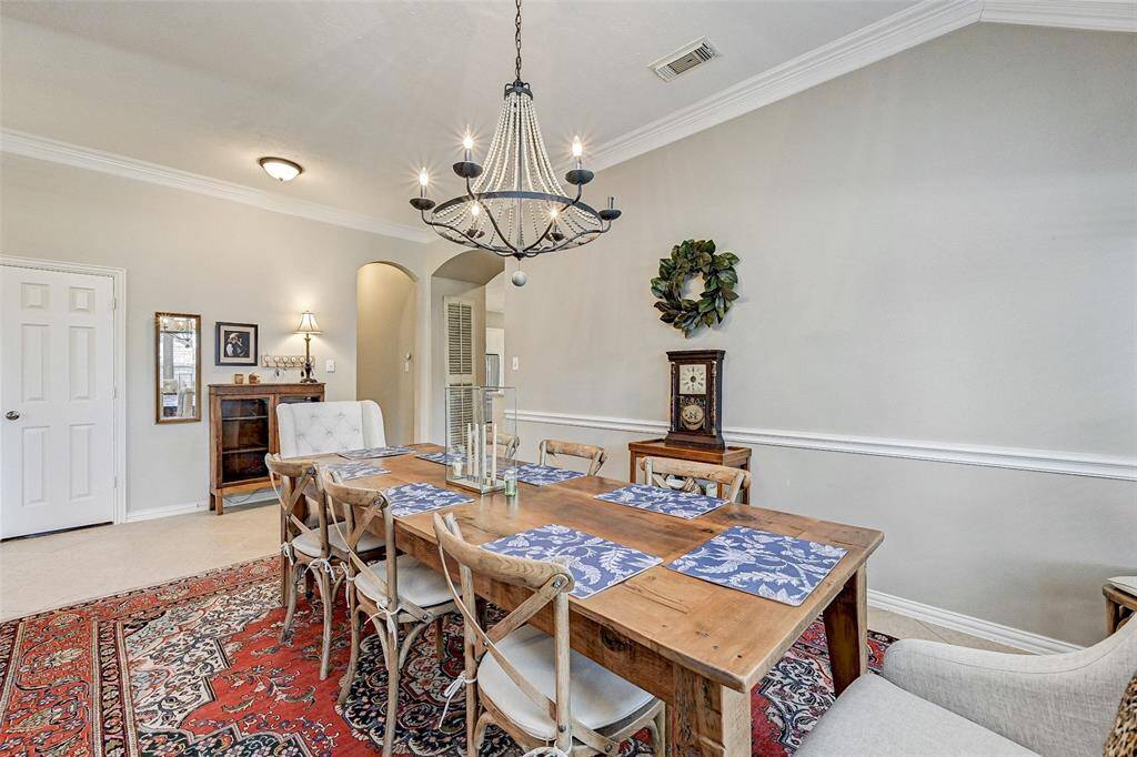 This dining room features an open, airy feeling with ample room for large gatherings.