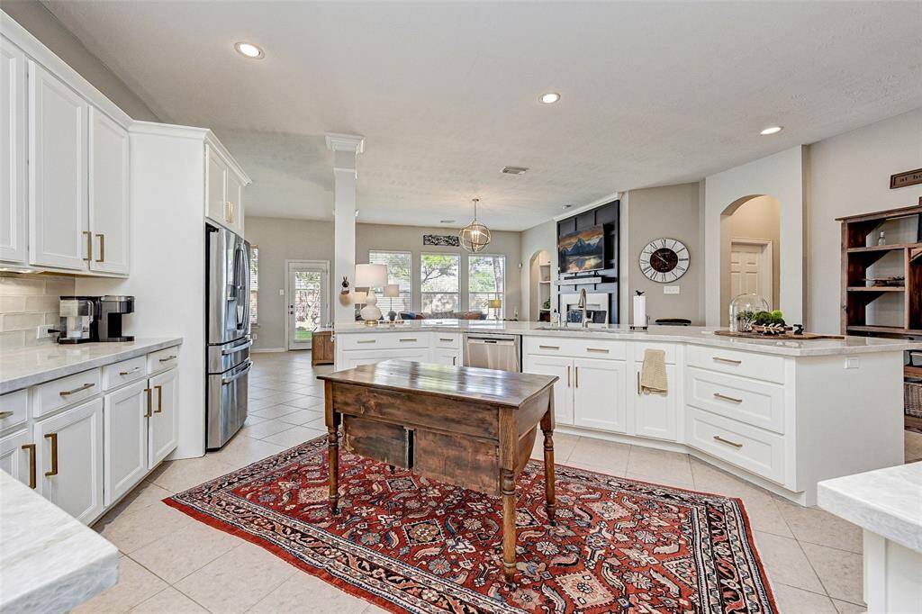 Spacious kitchen completely remodeled 3 yrs ago.  The open layout connects to a cozy living area with a view of the outdoors.
