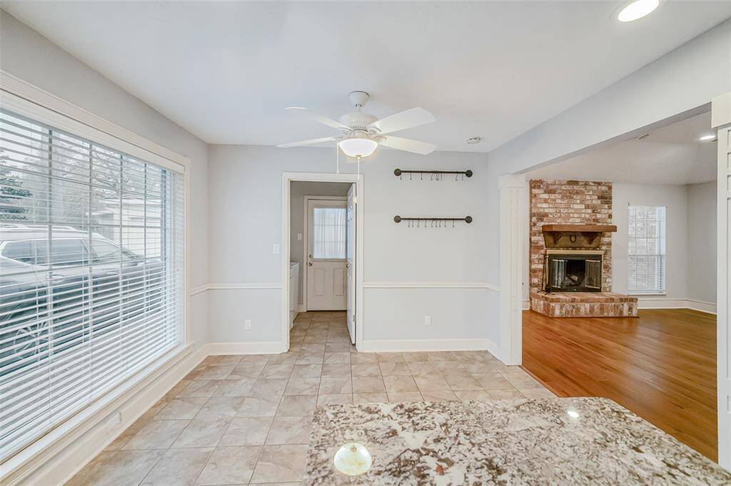 A view of the breakfast nook and door leading to the utility room and then the patio!