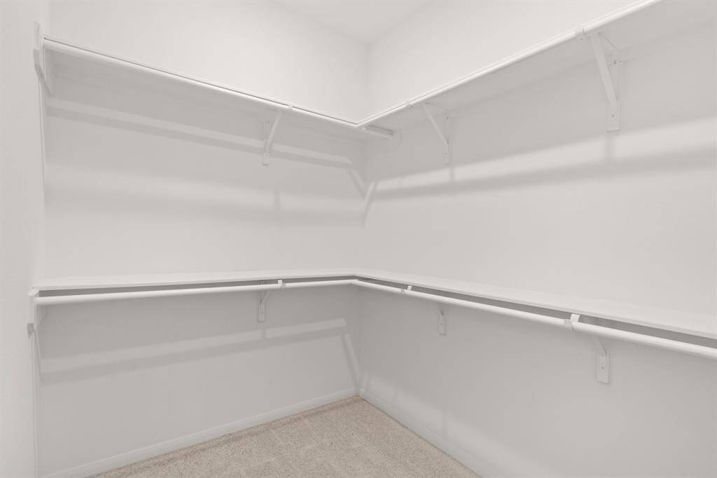 A view of your large primary walk-in Closet