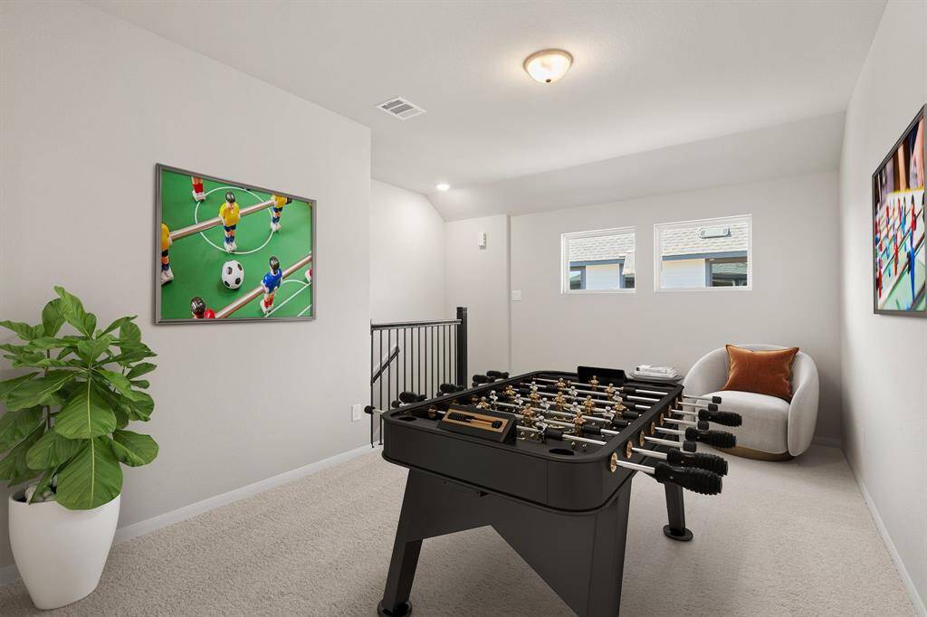 As you make your way upstairs this exceptional game room is a standout feature in this remarkable property, offering a space that combines luxury and fun for all ages.