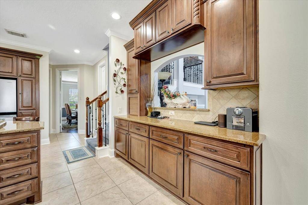 Bar in kitchen overlooking living room.