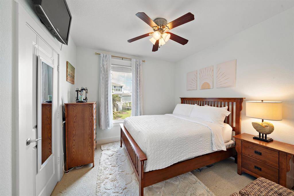 Your guests will love this guest room with queen sized bed and television.