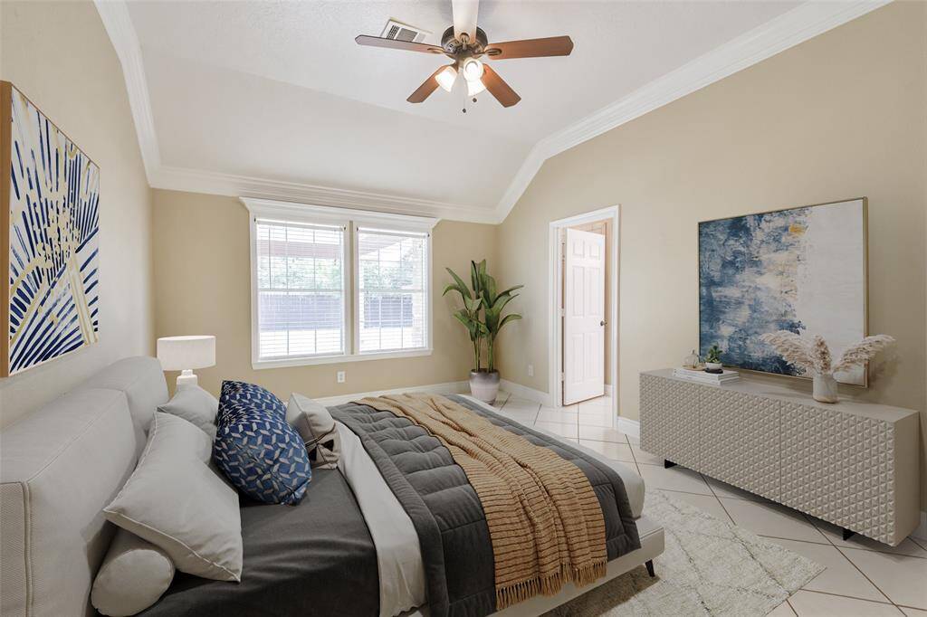 Primary bedroom features a private en-suite bath