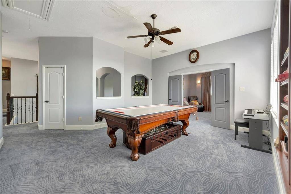 Upstairs gameroom with spectacular view of the lake.