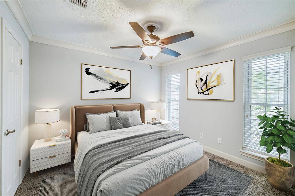 One of the 3 secondary bedrooms virtually staged.  Great for a teenager or even a home office!