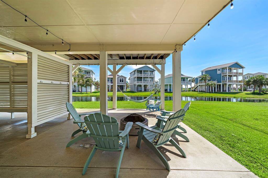 Outdoor entertaining at its best!  Fire pit, swing and hammock included (adirondack chairs are excluded).  S'mores anyone?