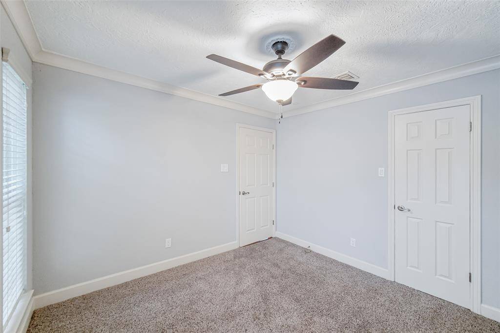 All secondary bedrooms have ceiling fans and generous closet space.