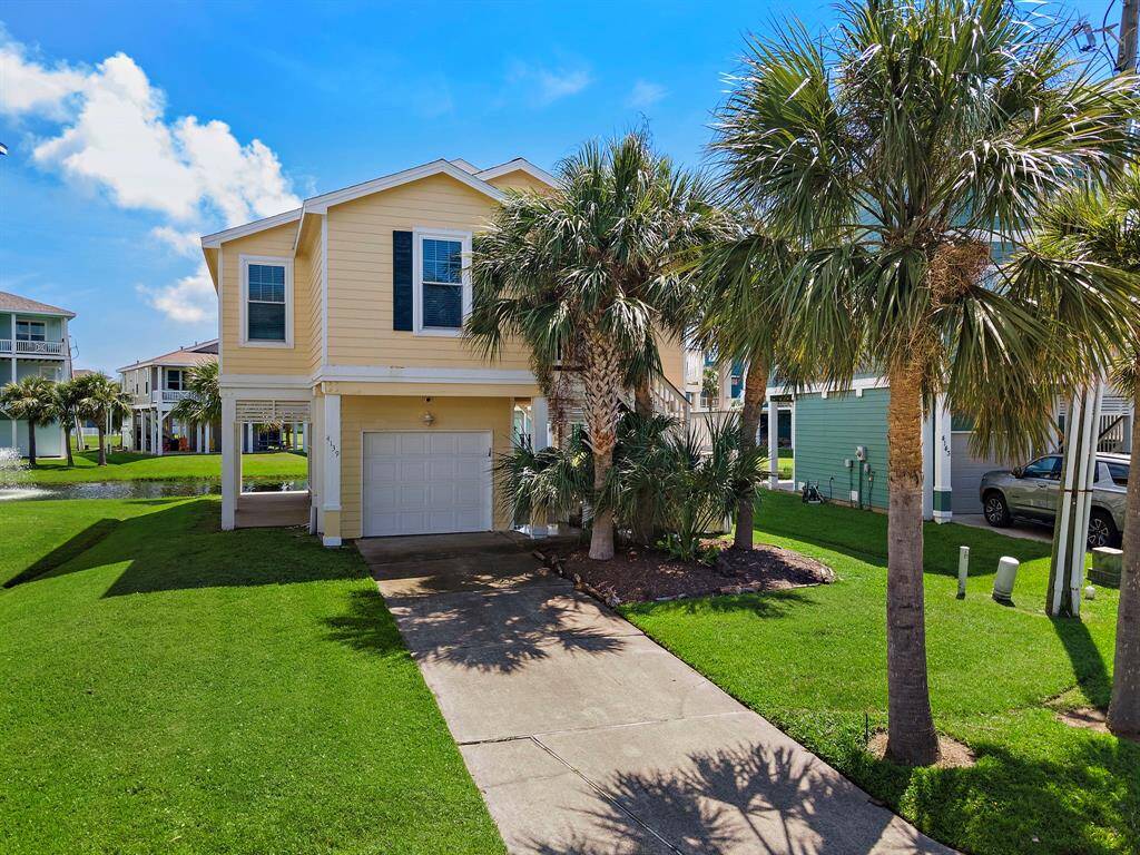 Tropical landscaping and sprinkler system with easy maintenance since the HOA handles lawn care for you.