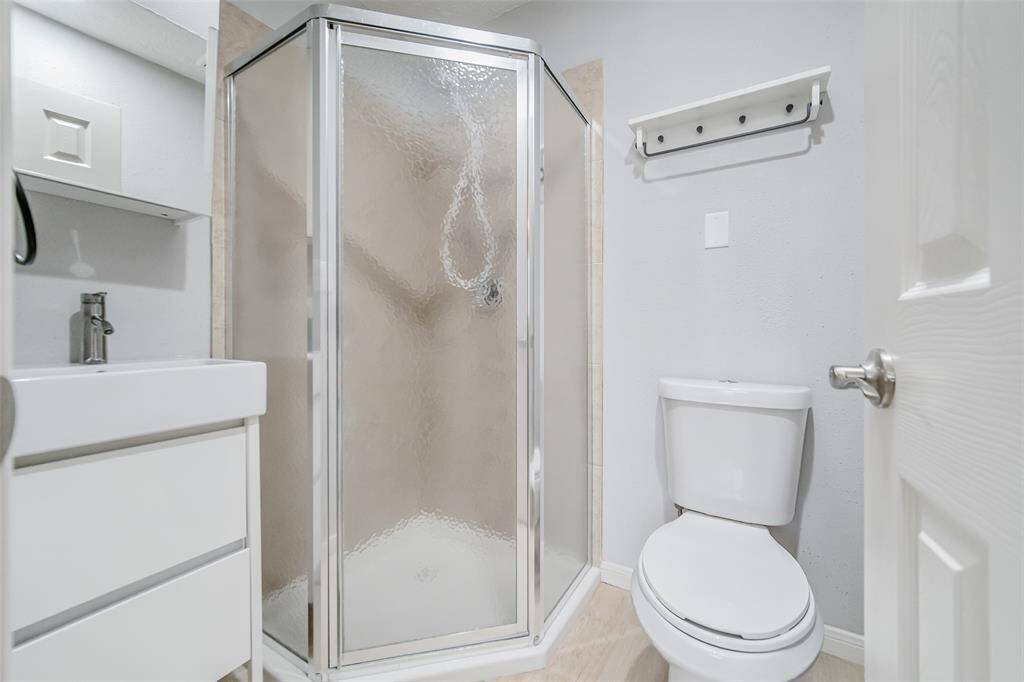 Secondary bath with stand up shower.