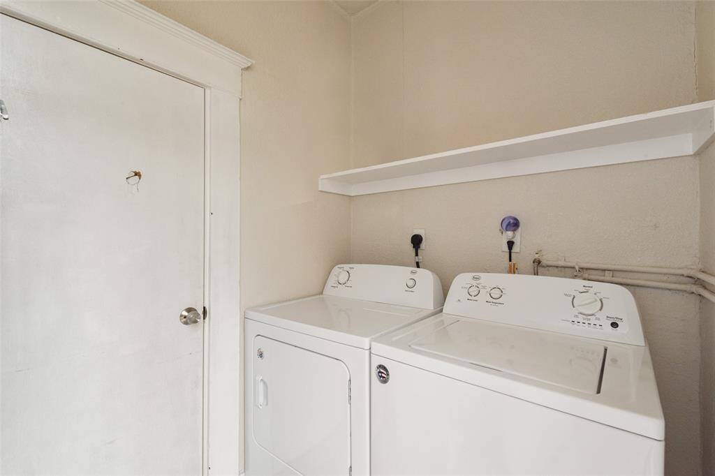 mud room/laundry with access to outside