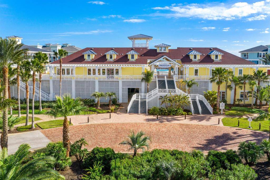 The grand Beach Club is private with amenities and golf cart parking underneath.