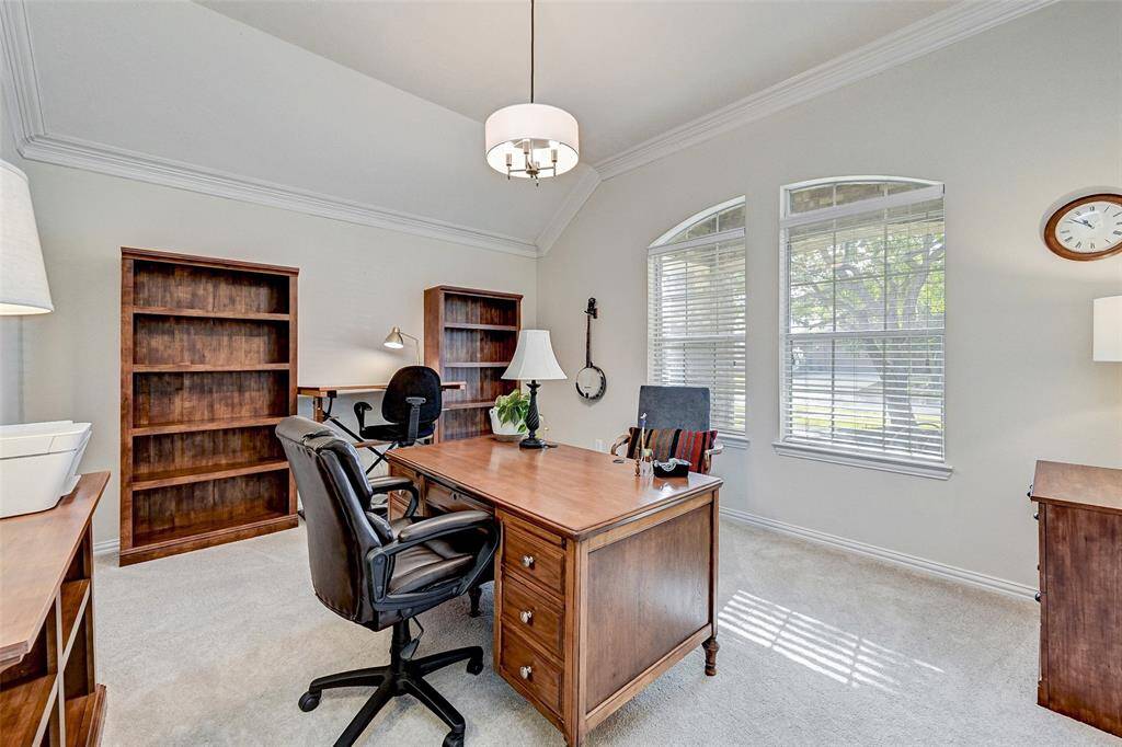 Study features high ceilings and crown molding
