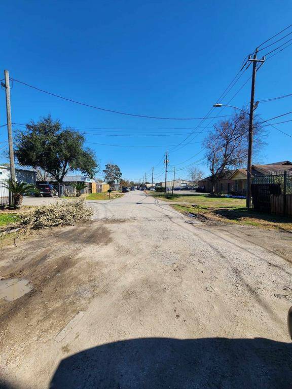 Charming street view from the gate entrance, offering a welcoming glimpse into the neighborhood.