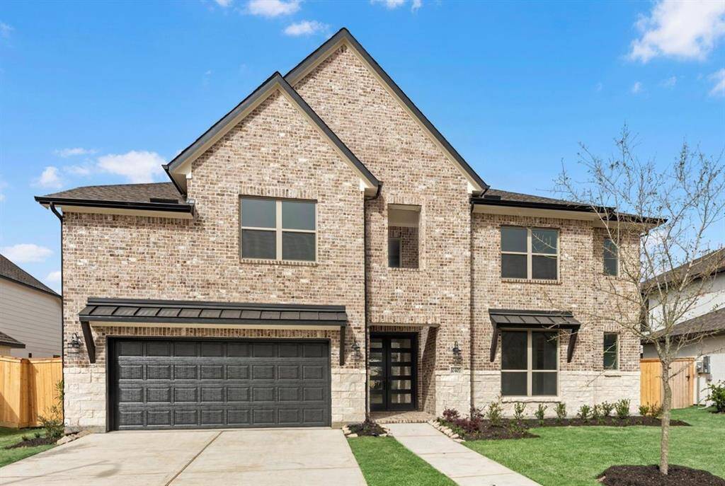 MOVE IN READY!! Westin Homes NEW Construction (Naples II, Elevation A) Two story. 4 bedrooms, 3.5 baths. Green grass added to enhance photo.