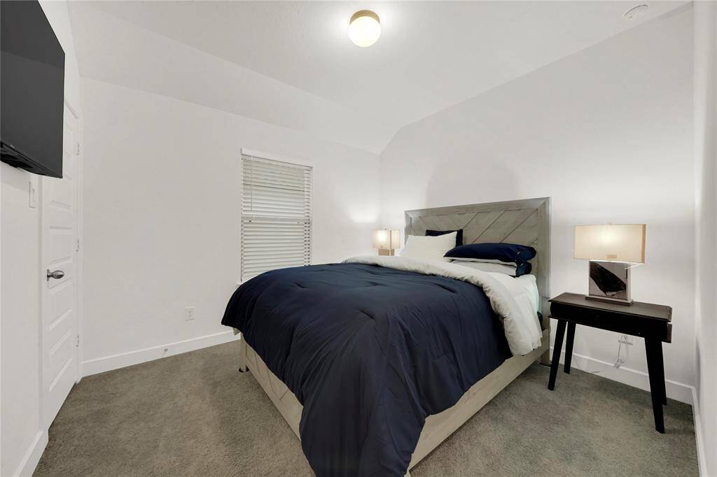 Bedroom #3 upstairs is spacious enough for a queen size bed and other furniture