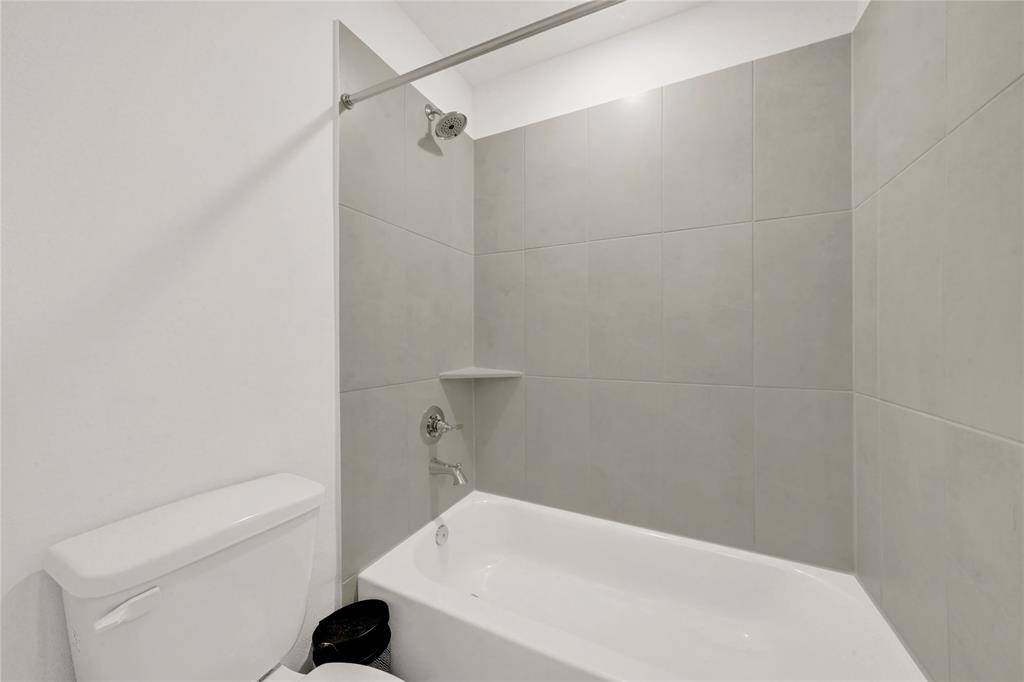 The upstairs bath with tub/shower combo