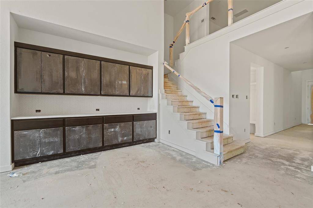 Cozy dining area steps from the kitchen, featuring a built-in hutch.