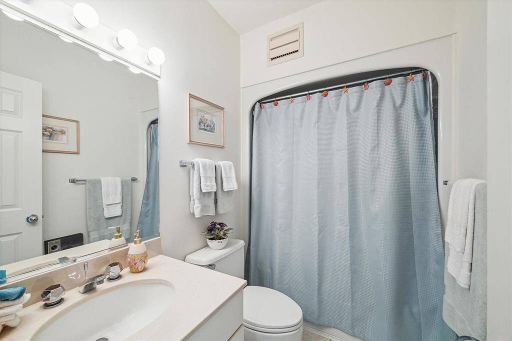 Primary ensuite bath includes a tub/shower combination.
