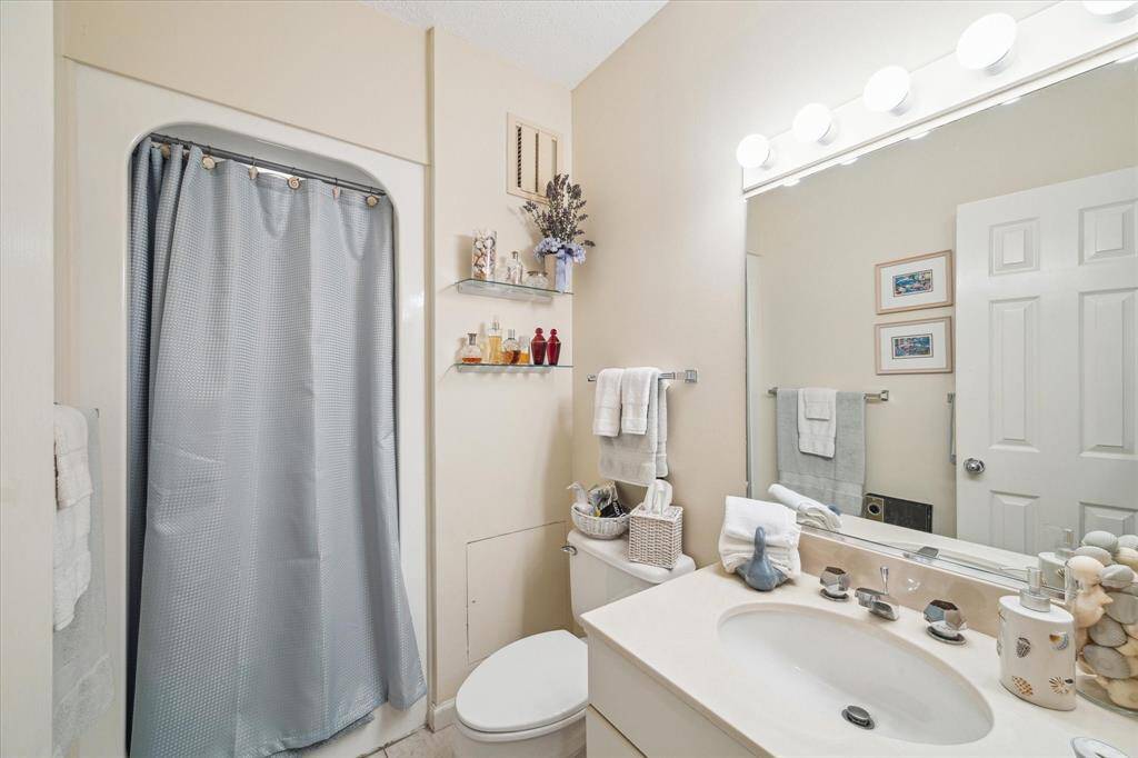 Secondary bath features a shower.