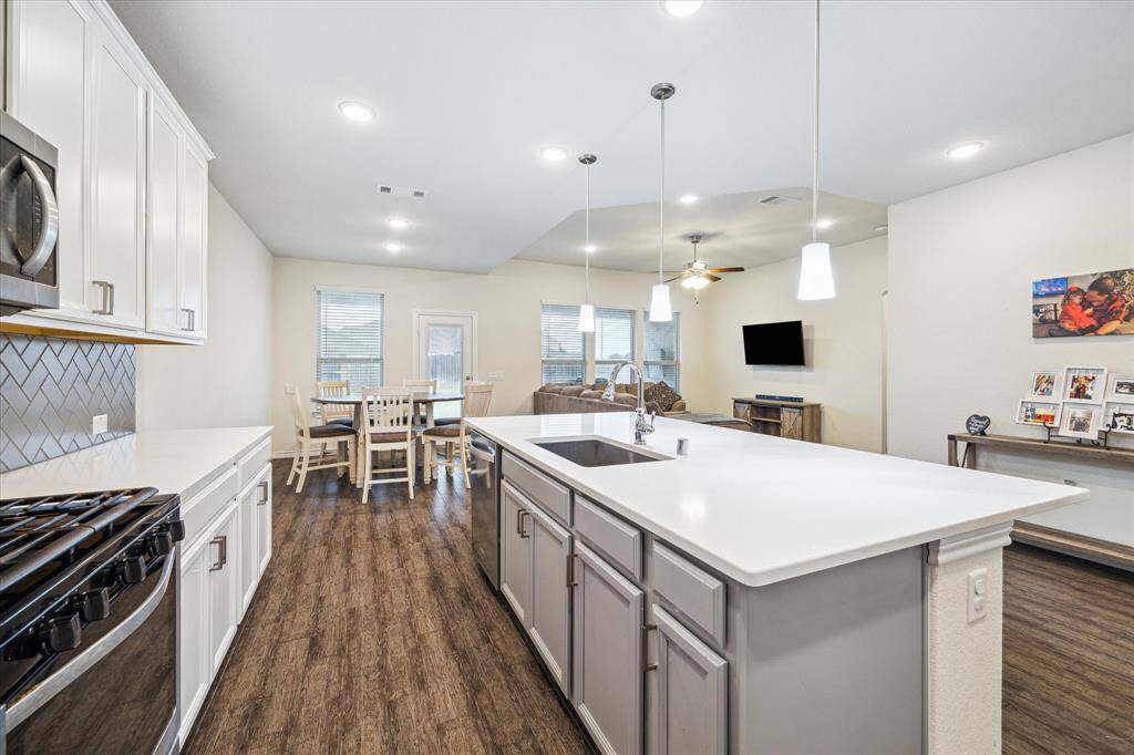Come home to prepare meals quickly and efficiently in this functionally designed kitchen.
