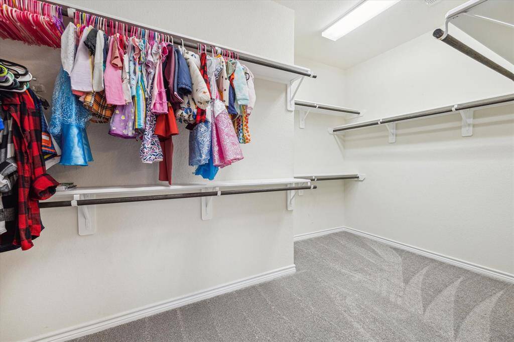 The spacious walk-in closet eliminates early morning traffic jams.