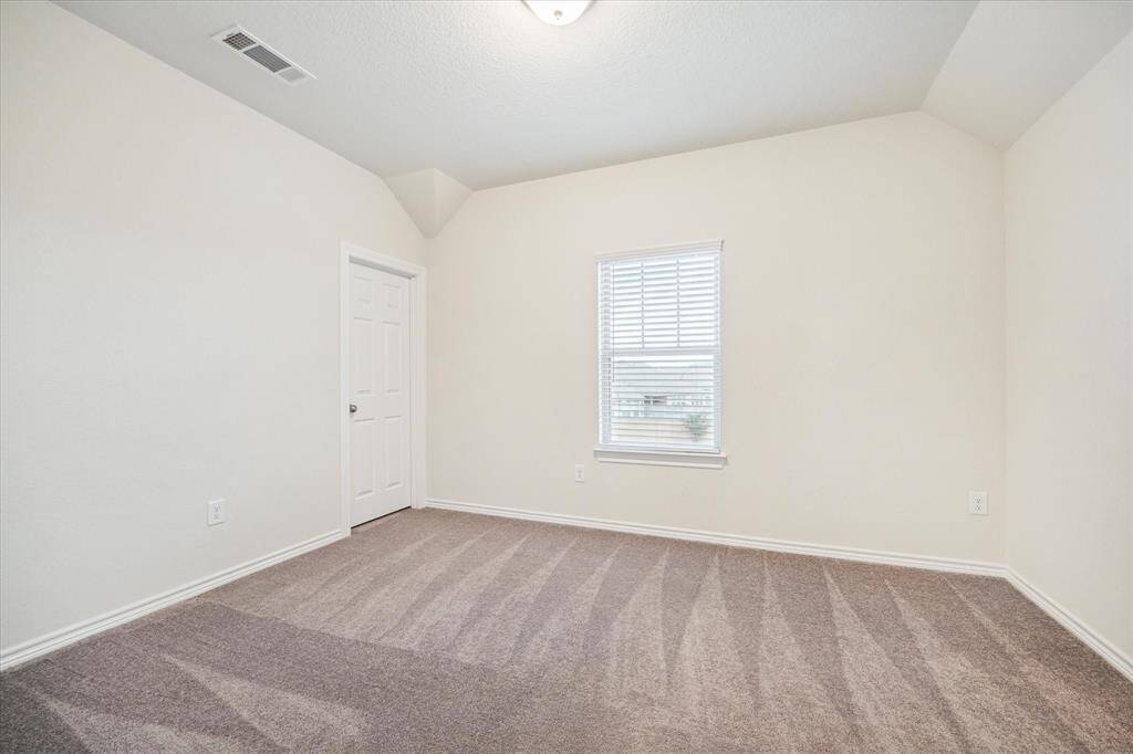No-nonsense Secondary Bedroom (13x10 and 9 ft ceiling) with plenty of space for sleep, storage and play.