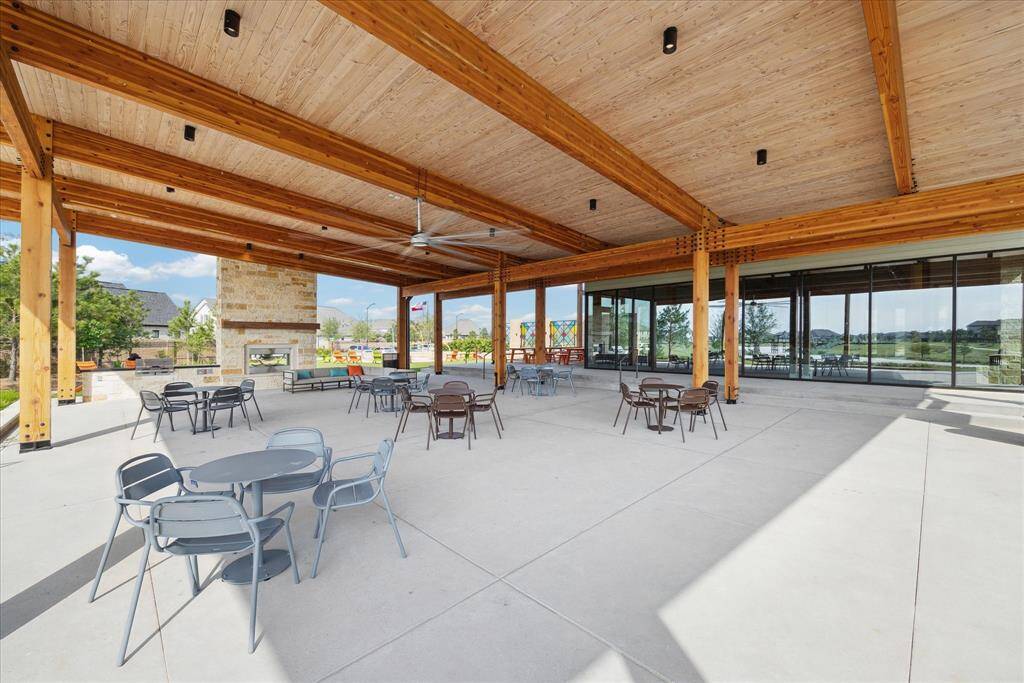 Head to the patio and fireplace overlooking the lake and bring something to grill.