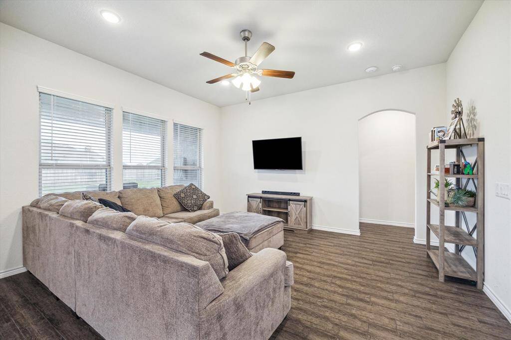 This area will be the center of your entertaining and a place for relaxation.  The soft arched entry to the right in the picture takes you to the primary suite.