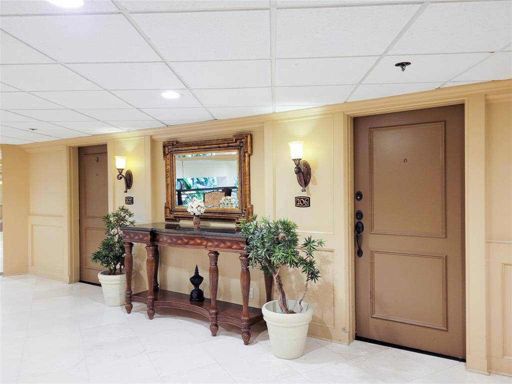 Elegant upper-level foyer with classic detailing.