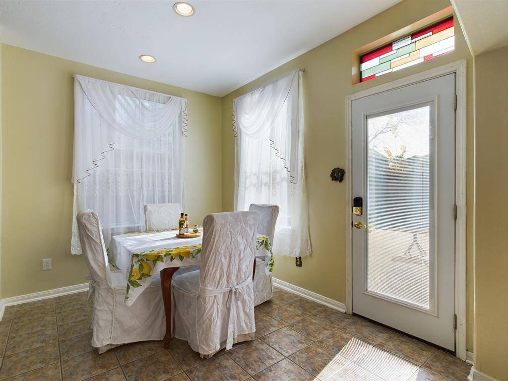 Eat-in dining area leads to the backyard.