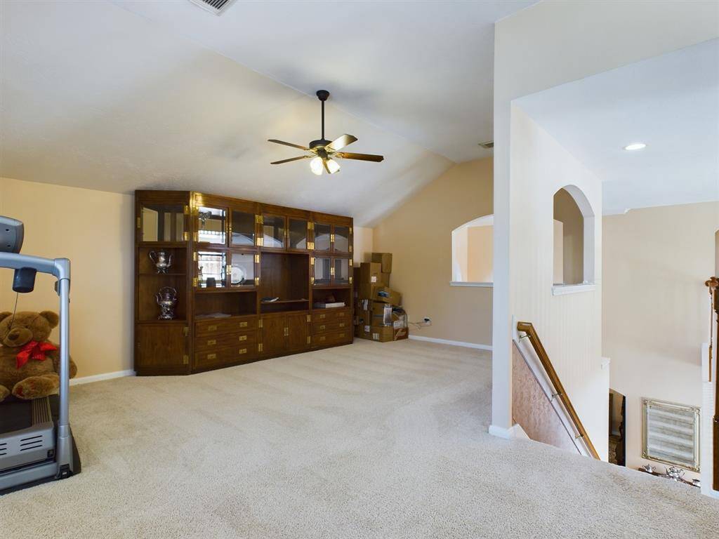 Upstairs welcomes you with an oversize game room perfect for family entertainment