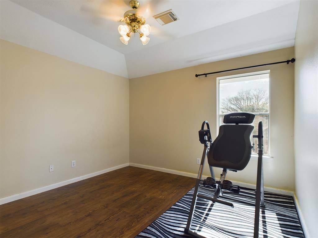 Third bedroom is bright with luxury vinyl planks