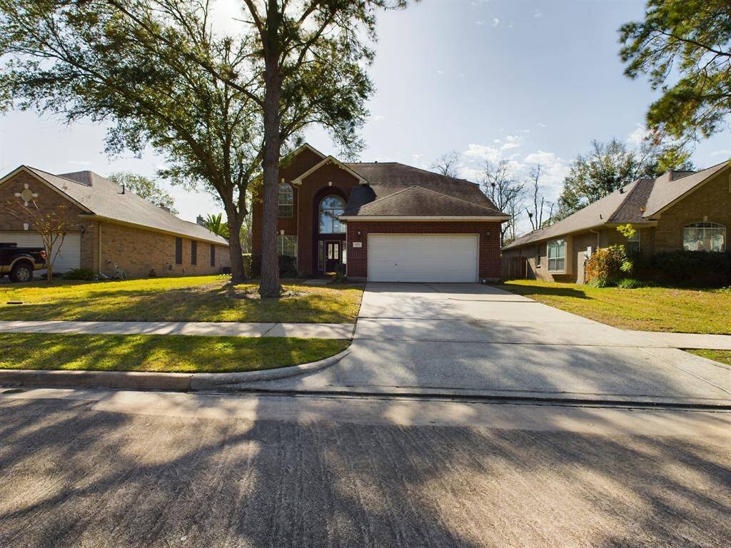 Mature trees enhance this curb appeal