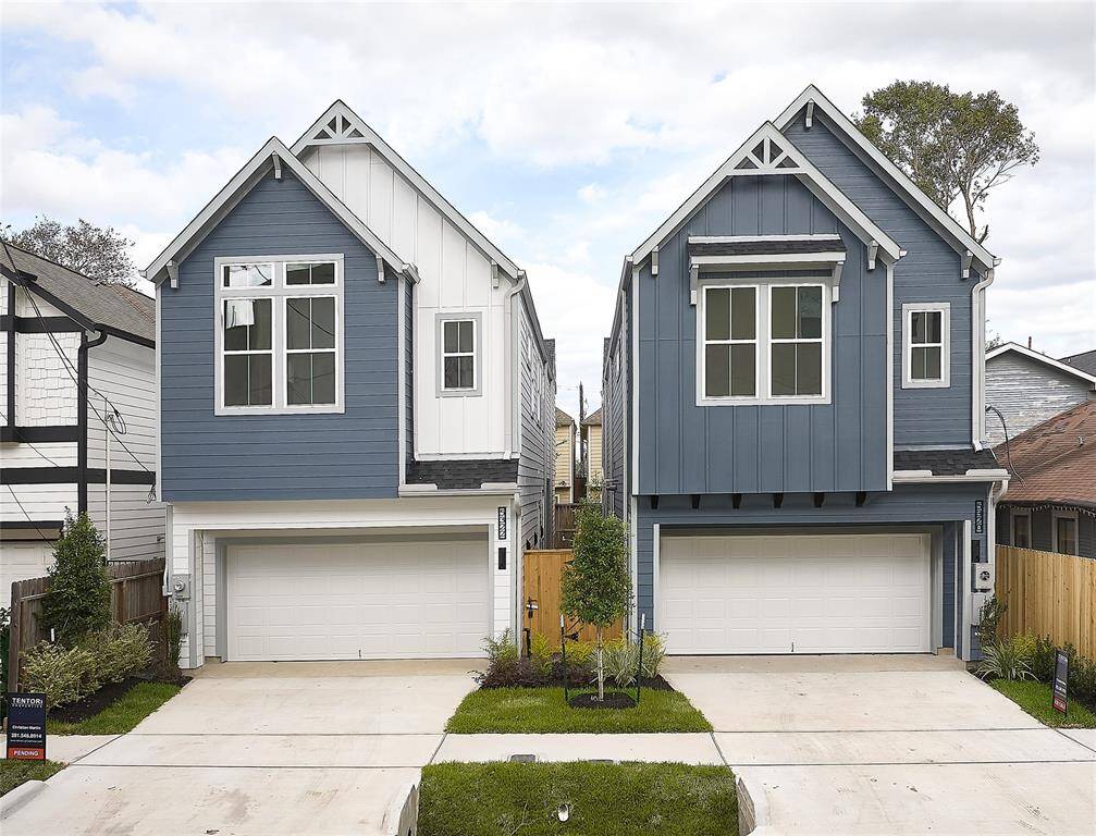 A captivating modern farmhouse façade with clean lines and welcoming charm.?